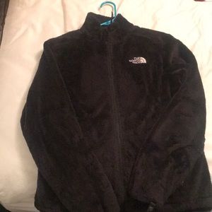 Black furry north face zip up